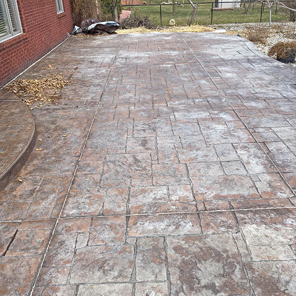 Stamped concrete before restoration