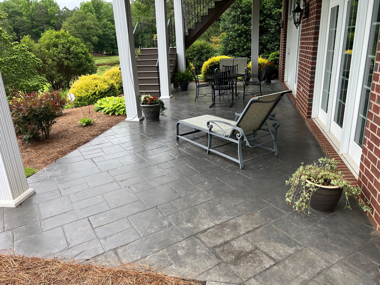 Worn patio before restoration