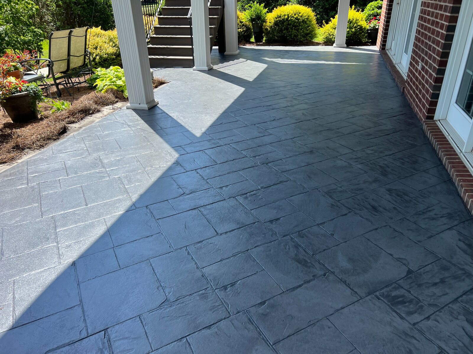 Restored patio beside the home